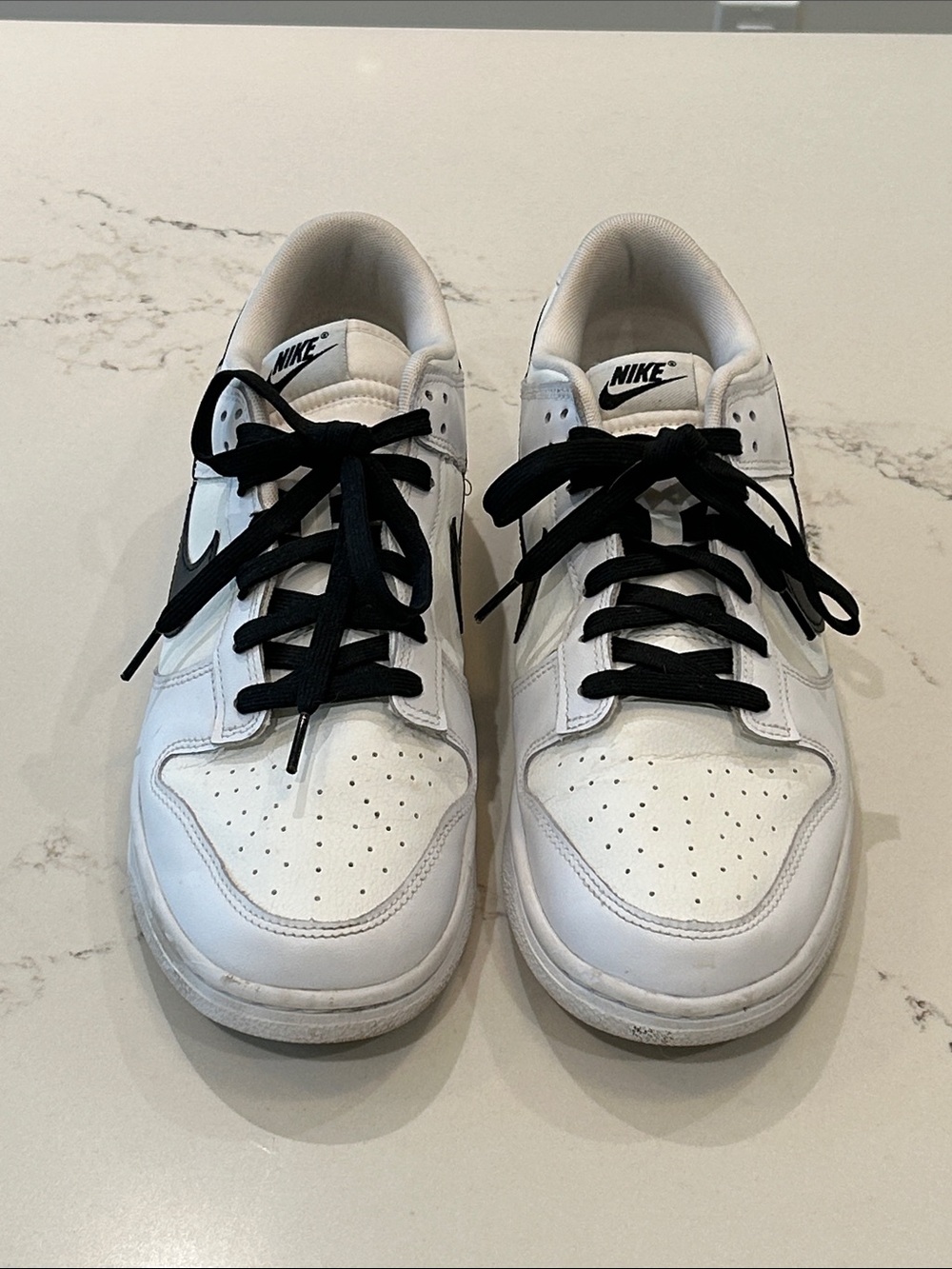 Nike Men’s White Low-Top Sneakers with Black Swoosh and Laces
